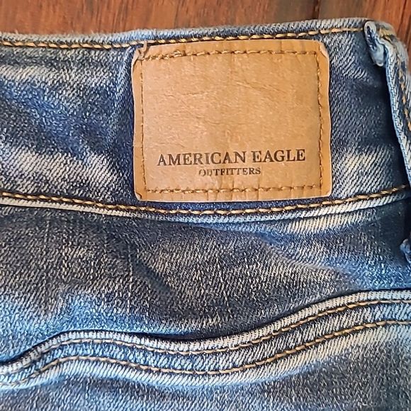 American Eagle Mini Jean Skirt Distressed Worn Denim Frayed Hem Mid Wash Pockets - Picture 9 of 16